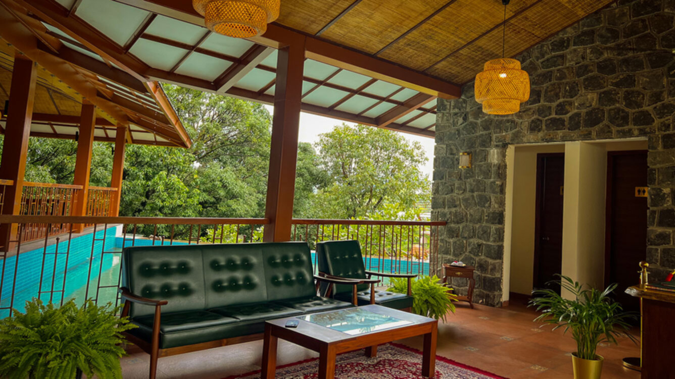 Outdoor dining with mountain view at Antheia Resorts